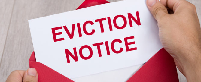 Hand Holding Invoice In Envelope