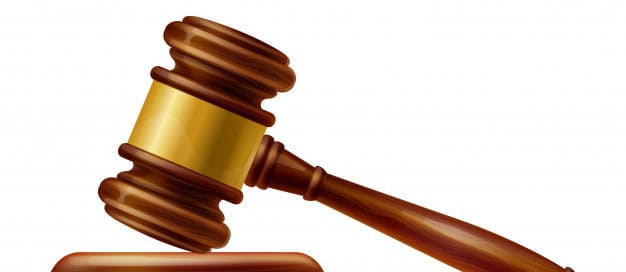 Wooden judge’s gavel representing Texas landlord-tenant law and legal procedures for serving a notice to vacate.